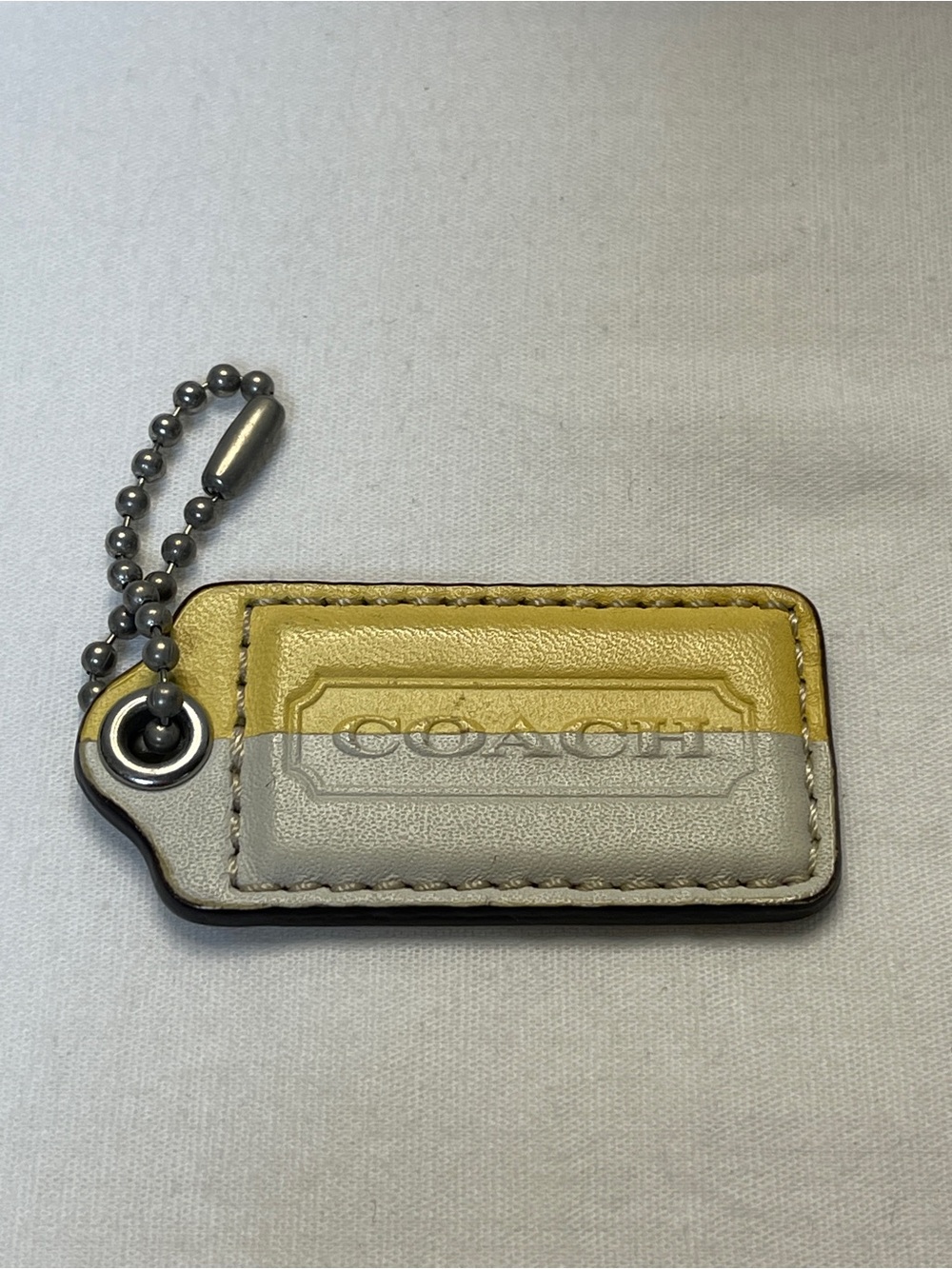 COACH Yellow and Cream Leather Two-Tone Hang Tag with Ball Chain